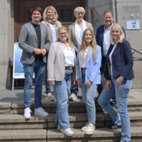 Bürgermeister Mario Dahm (links) mit dem Team der Wirtschaftsförderung.
